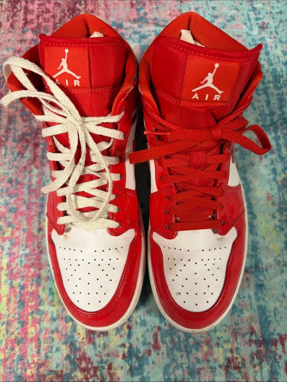 Jordan men’s High Top Sneakers in Red and White with Multicolor Collar